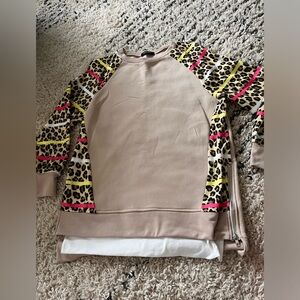 Long sweatshirt top with side zipper and fun animal print sleeves Chic Me